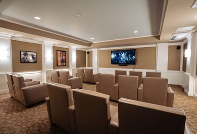 Comfortable common area with seating and a TV
