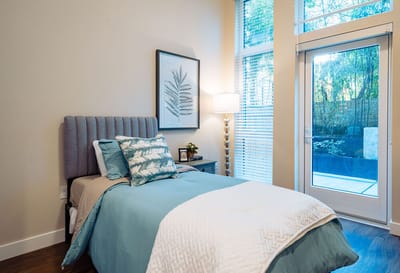 Cozy private resident room with a bed and natural light
