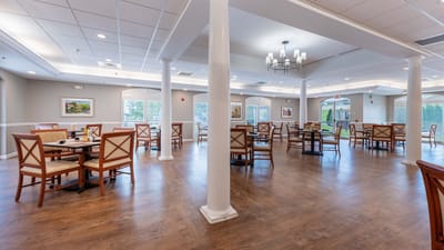Bright dining room with tables and chairs