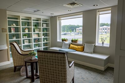 A cozy common area with comfortable seating and decor