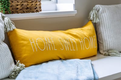 Decorative pillow with the phrase 'Home Sweet Home'