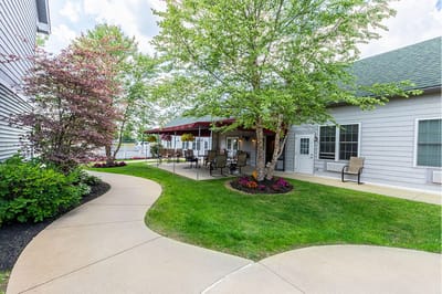 Pathway leading to a shaded outdoor seating area
