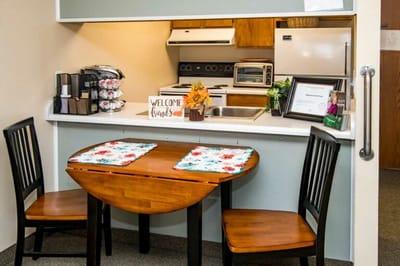 Cozy kitchen table setting in a resident's room