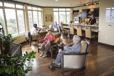 Residents enjoying a social gathering in a common area