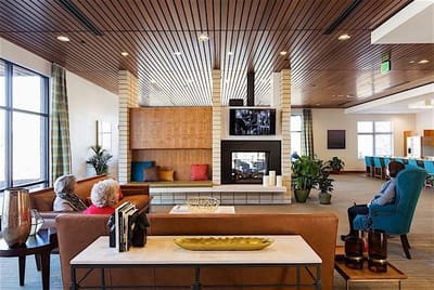 Residents enjoying a cozy common area with seating