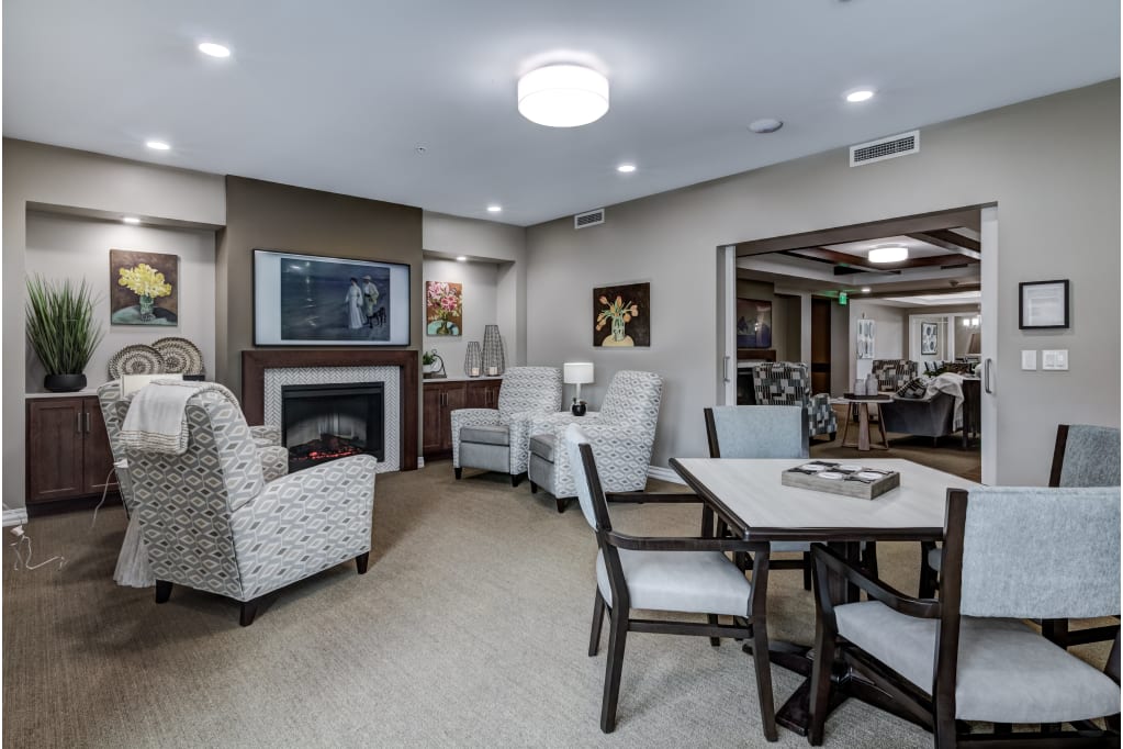 Cozy common area with seating and decorative art