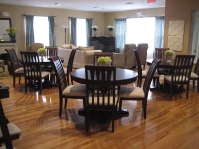 Bright common area with seating and tables