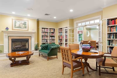 Cozy library and lounge area in a senior living facility