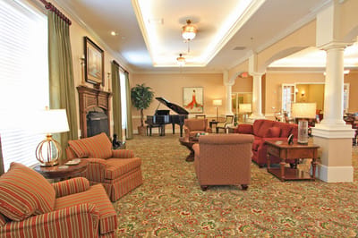 Cozy common area with seating and piano