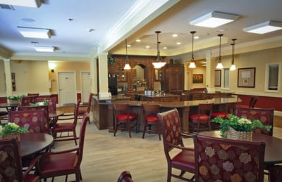 Bright dining area with wooden tables and chairs