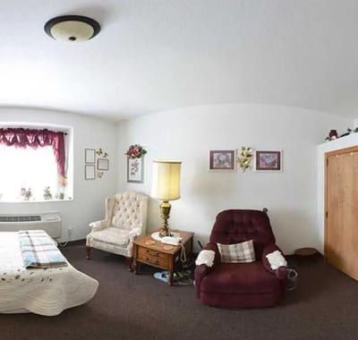 Cozy resident room with armchairs and decor