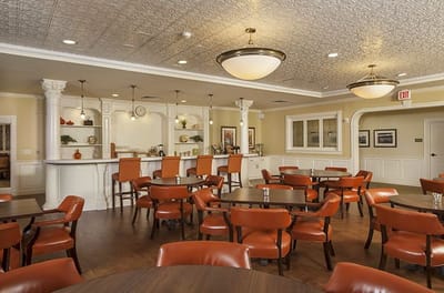 Bright dining room with tables and chairs