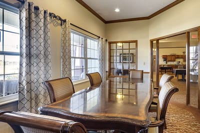 Dining area with wooden table and elegant decor