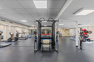Interior view of a fitness area with exercise equipment