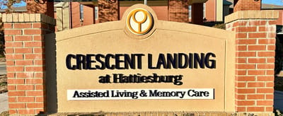 Crescent Landing facility sign displaying name and services