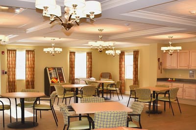 Interior view of a dining area with tables and chairs