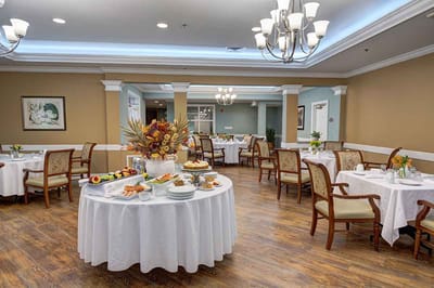 Dining area with tables set for a meal