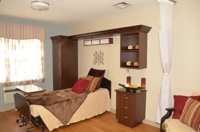 Cozy private resident room with warm decor