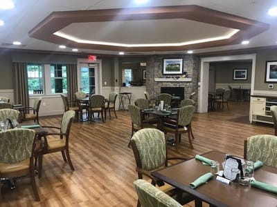 Dining area with wooden floors and chairs