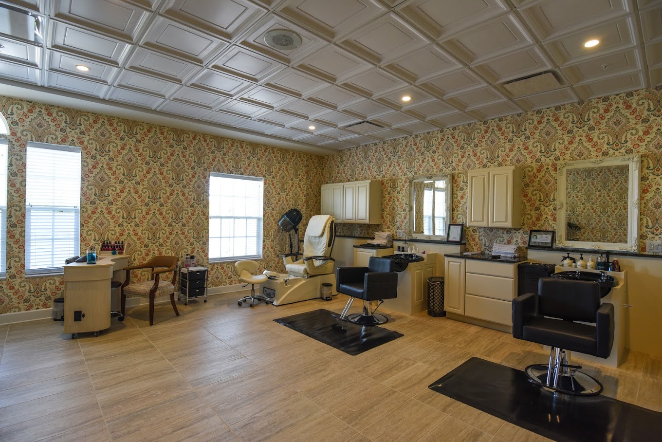 Beauty salon area with styling chairs and mirrors