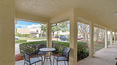 Outdoor seating area with chairs and a table