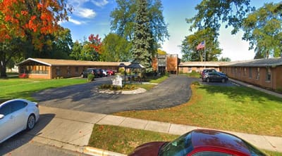 Exterior view of Jennings Terrace facility with gardens