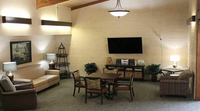 Comfortable common area with couches and a television