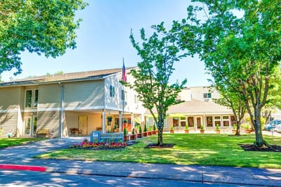 Exterior view of Junction City Retirement facility with gardens