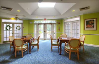 Bright common area with chairs and tables