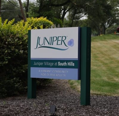Facility logo displaying community name