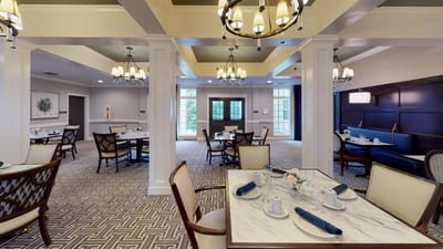 Dining area with tables set for meals