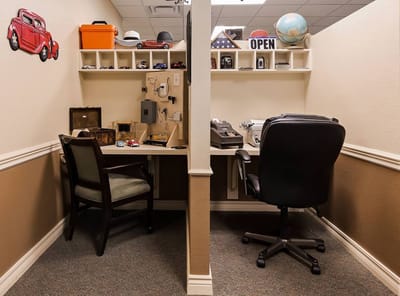 Interior space with two desks and decor items