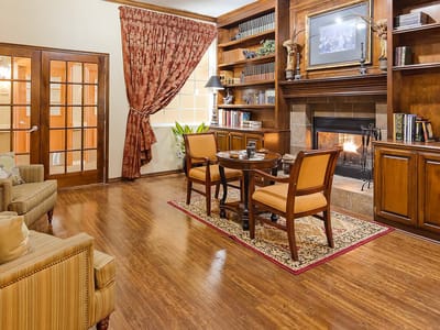 A cozy interior sitting area with a fireplace