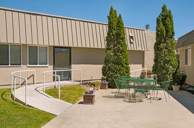 Outdoor patio area with seating and pathway