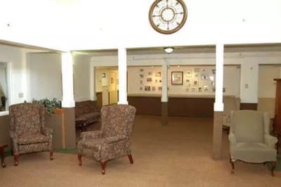 Common area with seating and wall decor