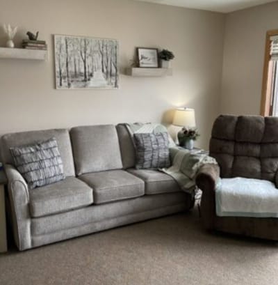 Cozy sitting area with a couch and armchair