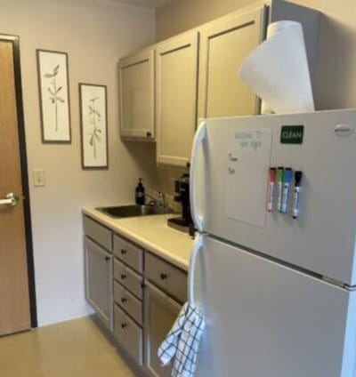 Bright kitchen area with modern cabinetry