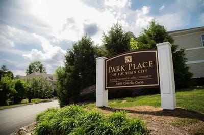 Signage for Park Place of Fountain City with landscaping
