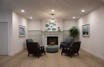 Cozy common area with seating and fireplace