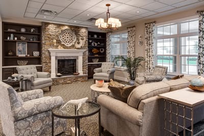 Cozy common area with seating and fireplace