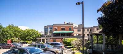 Exterior view of the facility with parking area