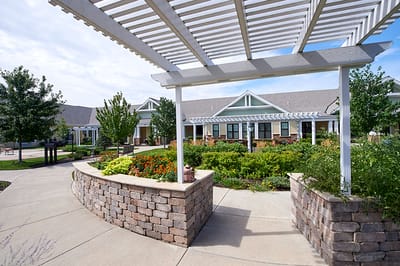 Garden area with seating and pathways at the facility