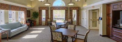 Bright common area with seating and natural light
