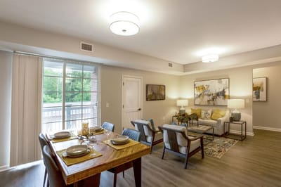 Modern living room and dining area in a senior facility