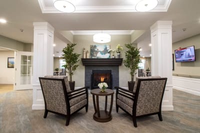 Interior common area with fireplace and seating