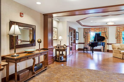 Interior view of a common area with a piano
