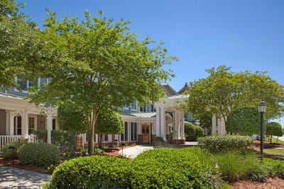 Exterior view of Sunrise at Siegen with landscaped gardens