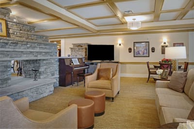 Common area with comfortable seating and a piano
