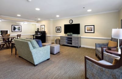 Common living area with seating and piano