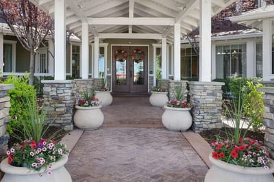 Exterior view of the facility entrance with floral decorations
